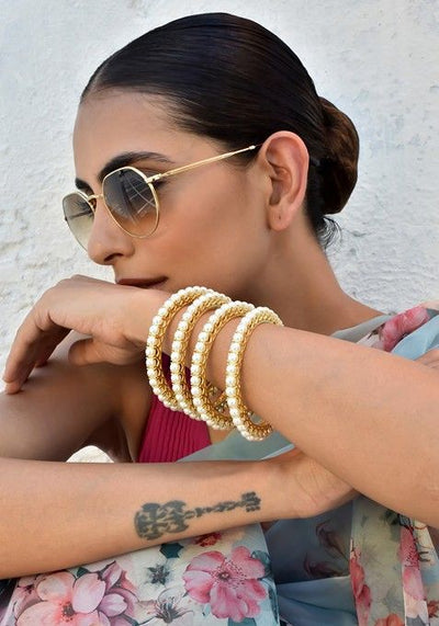 White Gold Tone Pearl Bangles